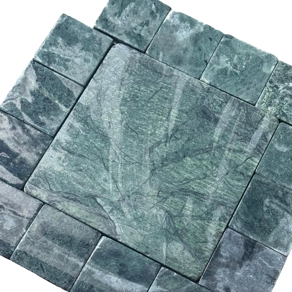 Green marble tile arrangement showcasing Verde Alpi Green Marble Tumbled product