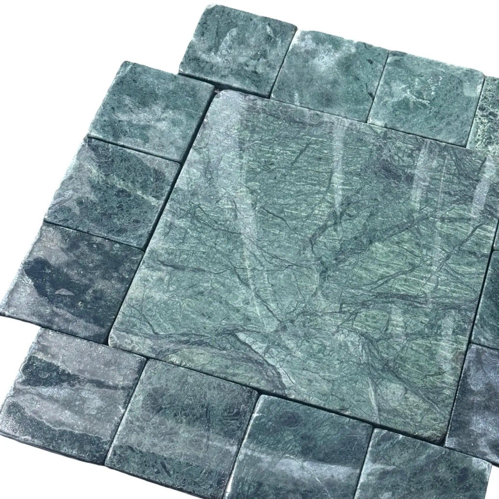 Green marble tile arrangement featuring Verde Alpi Green Marble Tumbled style