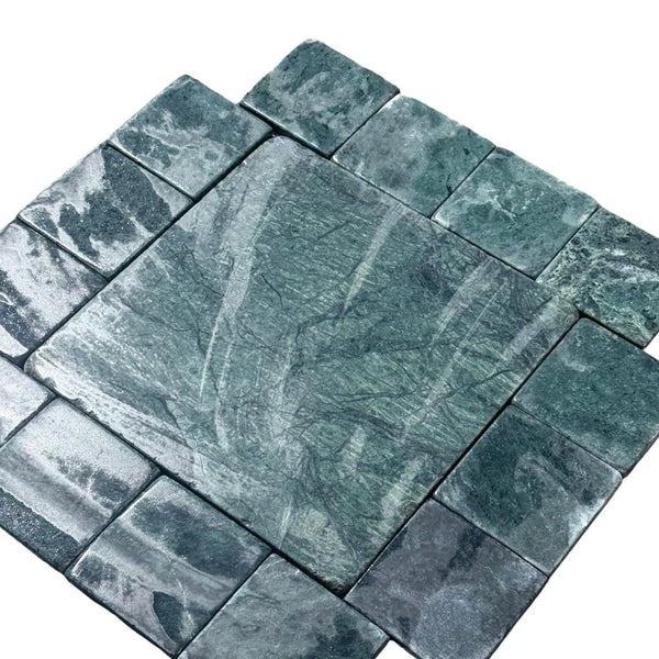 Green marble tile arrangement showcasing Verde Alpi Green Marble Tumbled product