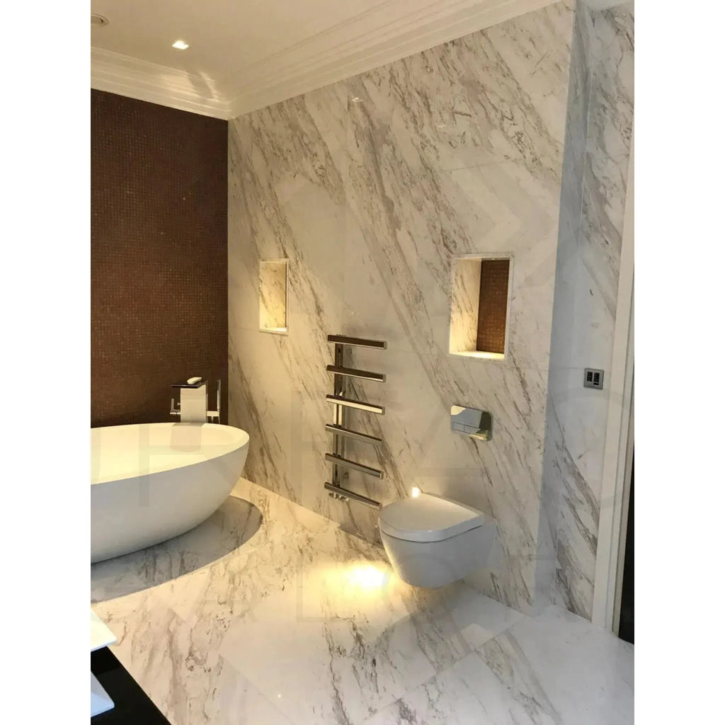 Luxurious marble bathroom featuring Volakas Marble 24x24 polished tile in elegant design