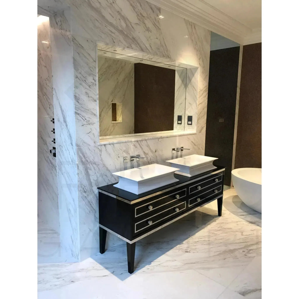 Double sink vanity featuring Volakas Marble polished tile with marble countertops