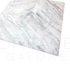 White Volakas Marble slab tile 24x24 polished, showcasing elegant Greek design