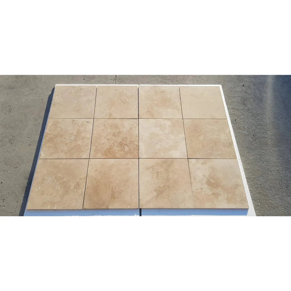 Beige travertine tile arrangement of Walnut Travertine 12X12 Filled and Polished