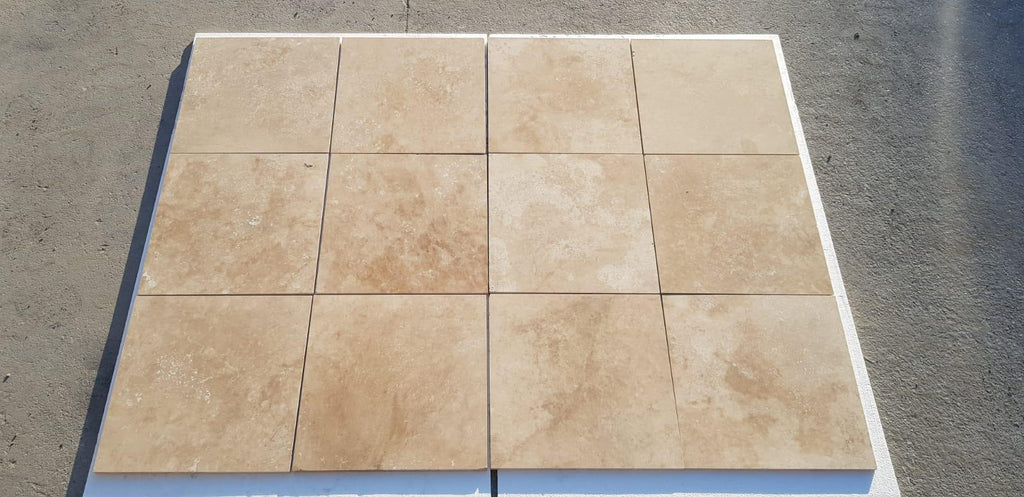 Beige Walnut Travertine 18x18 tile with natural stone texture and white grout