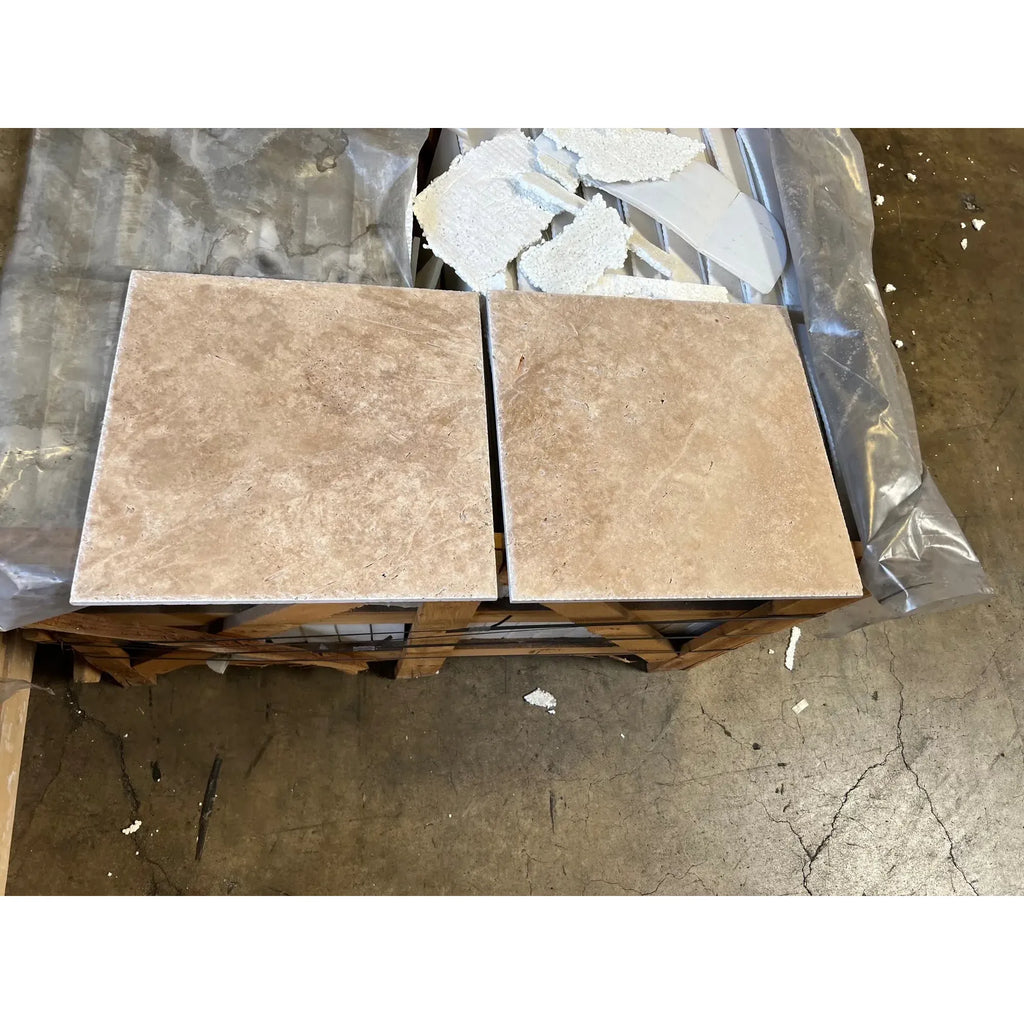 Square beige floor tiles from the Walnut Travertine 3X6 Tumbled collection