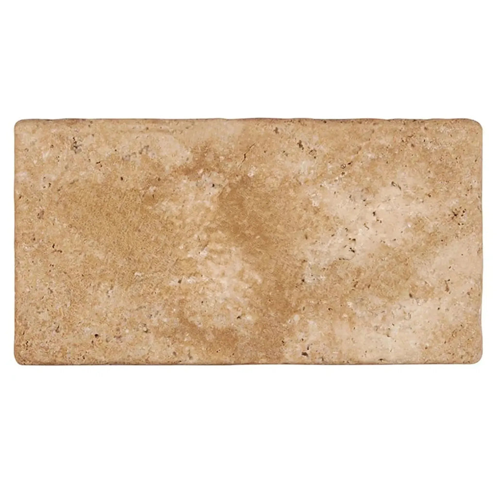 Rectangular Walnut Travertine 3X6 Tumbled tile showcasing natural texture and color