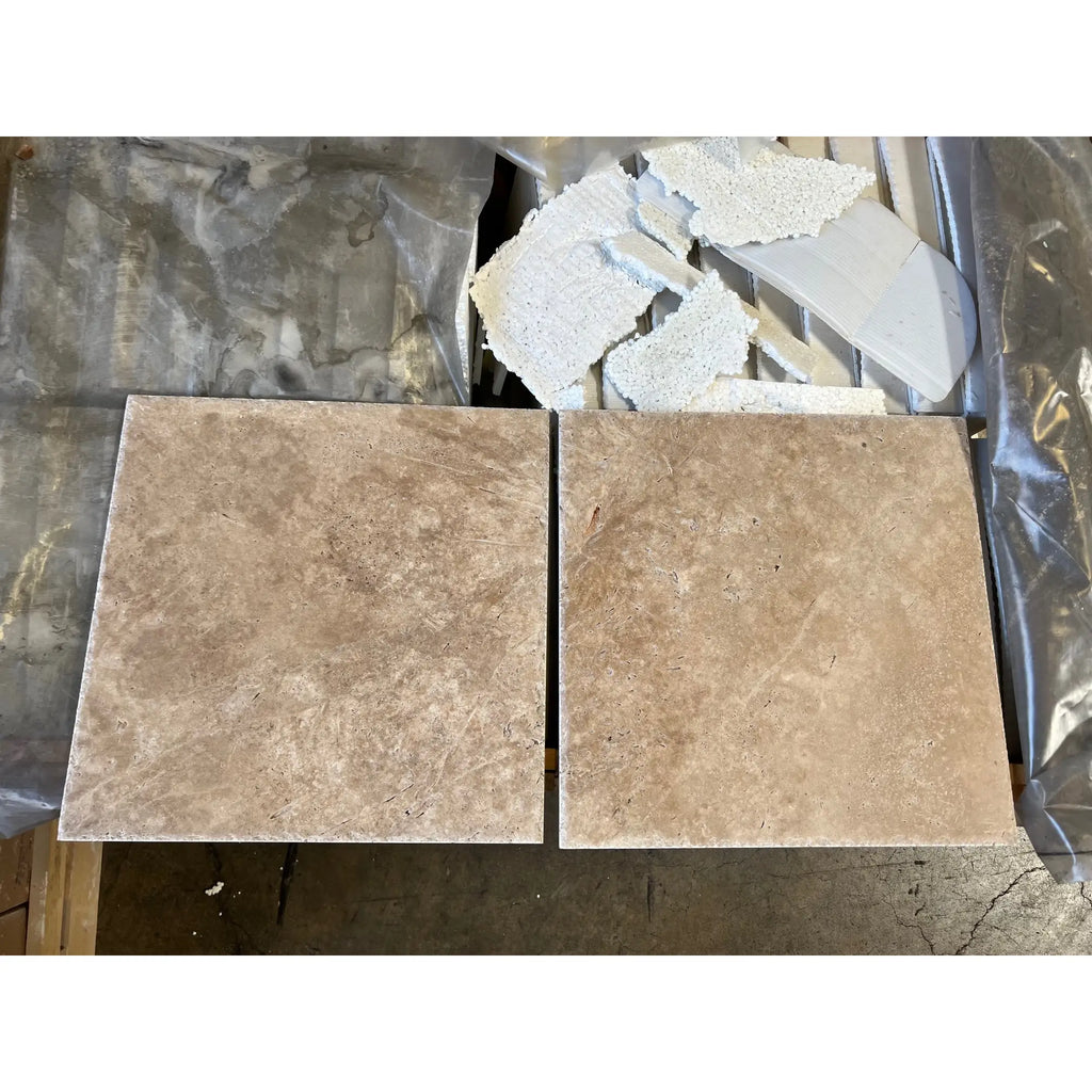 Beige floor tiles showcasing Walnut Travertine 3X6 Tumbled design and texture