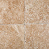 Four Walnut Travertine 6X6 Tumbled tiles showcasing natural stone texture