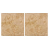 Two beige Walnut Travertine 6X6 Tumbled tiles displayed elegantly
