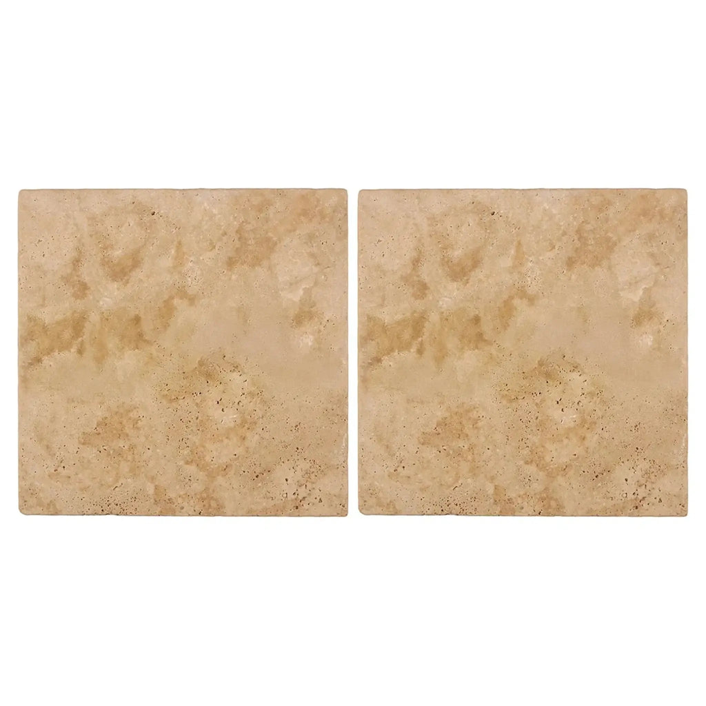 Two beige Walnut Travertine 6X6 Tumbled tiles displayed elegantly