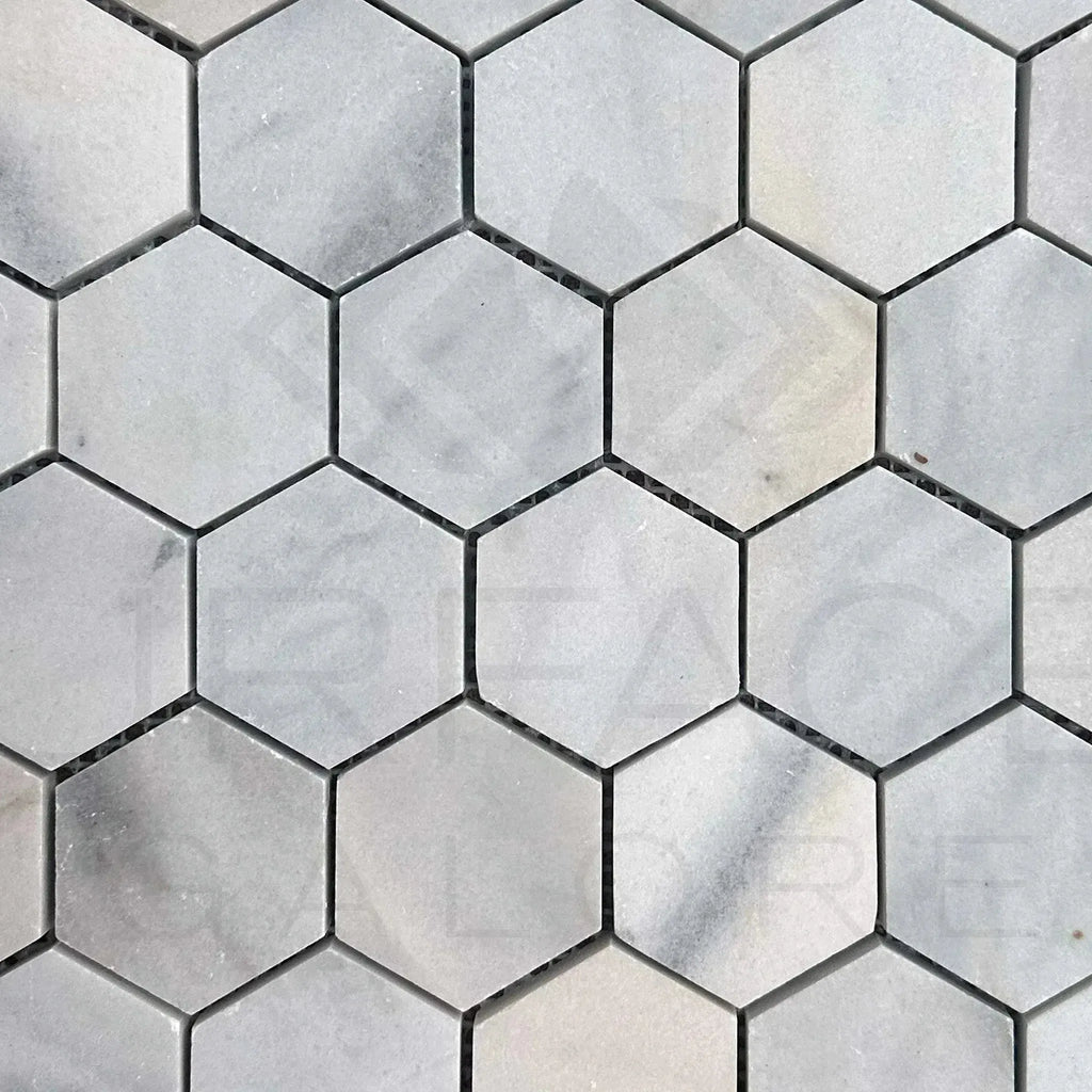 Hexagonal marble tile pattern of White Marble Bianco Venato 2 inch Honed Mosaic Tile