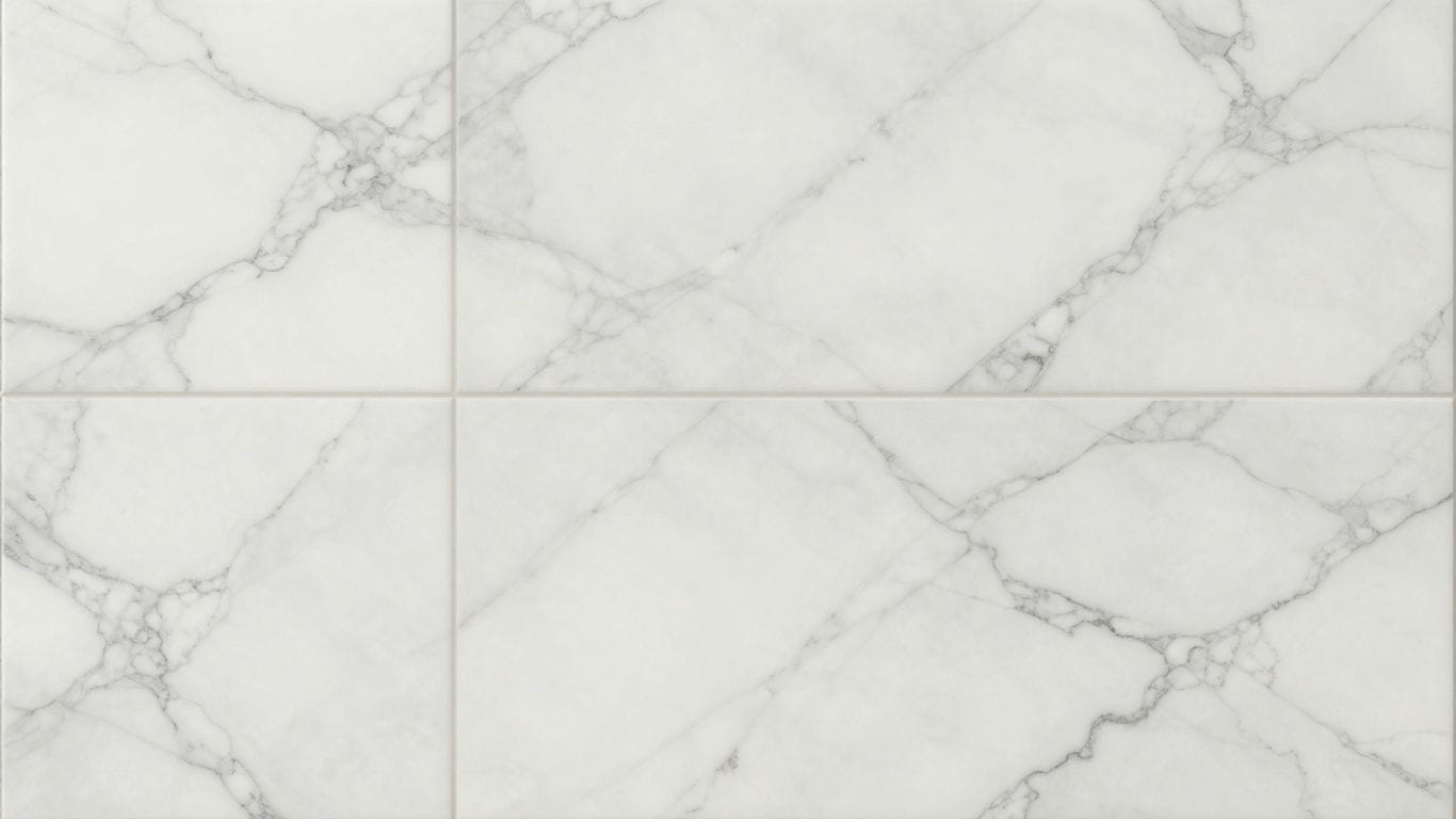 Carrara marble tiles with soft white and gray veining.