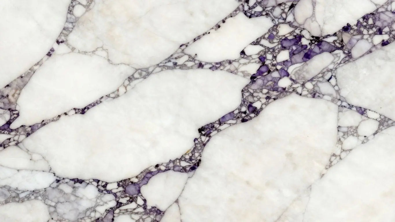 Calacatta Viola marble slabs with purple and grey veins.