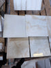 White Onyx Vanilla Onyx cross-cut 12x12 polished marble tile with veining
