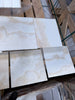 White Onyx Vanilla Onyx Cross-Cut 12x12 polished marble tile with beige veining