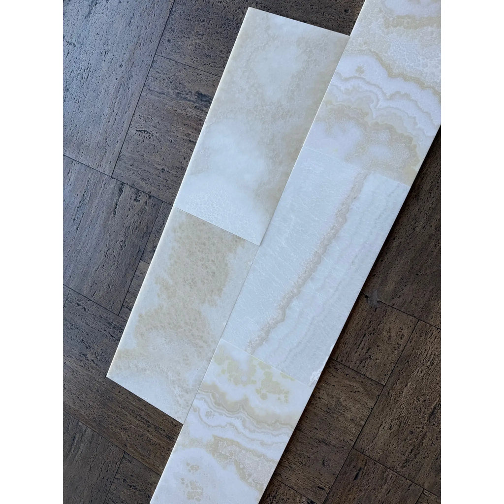 White Onyx Vanilla Onyx cross-cut 12x24 polished marble tile with veining