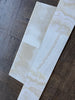 White Onyx Vanilla Onyx cross-cut 12x24 polished marble tile with veining