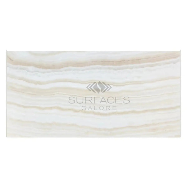 Swirling beige and white stone slab of White Onyx Bianco-Vanilla Marble Polished