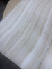 Cream and beige striped textured wallpaper with a wavy pattern for White Onyx Marble decor