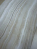 White onyx slab with prominent veining from White Onyx Bianco-Vanilla 12x24 marble polished