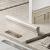 Cream-colored turkish marble baseboard with smooth polished finish and subtle veining in white pearl botticino chair rail molding