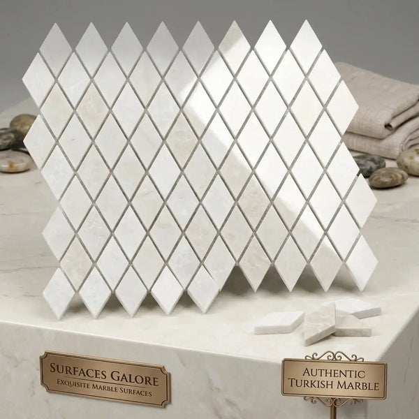 White diamond-shaped mosaic tiles made of authentic turkish white pearl and botticino beige marble arranged diagonally