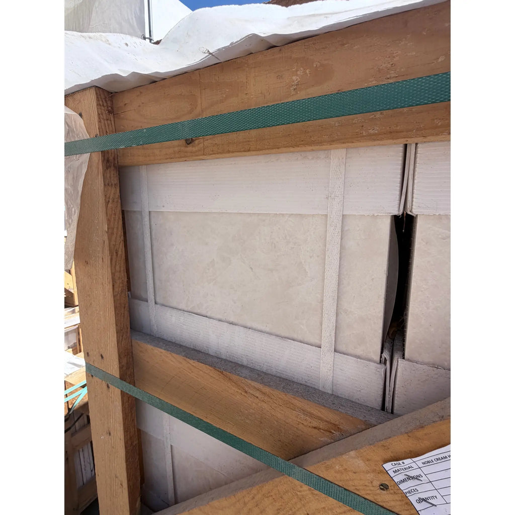 White pearl botticino beige marble 12x12 polished or honed tiles in white paneled wooden crate secured with green straps