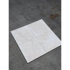 Four square light beige white pearl botticino marble 12x12 tumbled tiles with subtle veining arranged in a grid