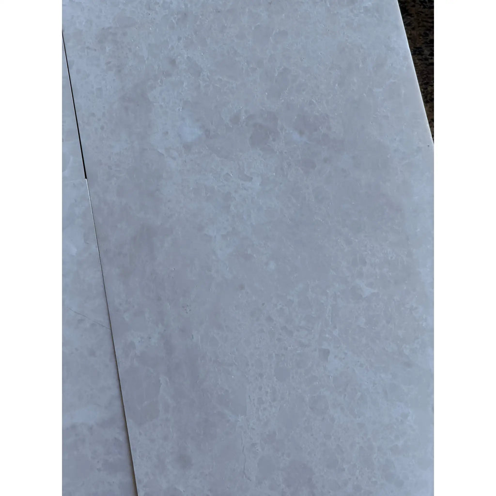 Light gray White Pearl marble 12x24 polished tile with veining