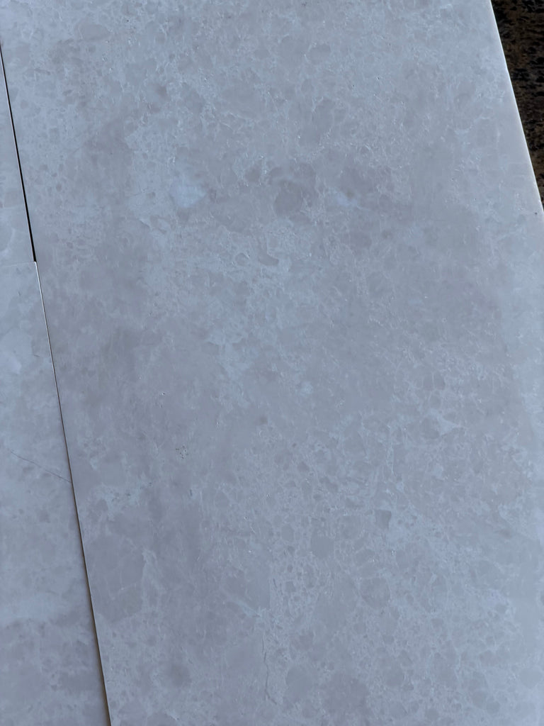 Light gray White Pearl marble 12x24 polished tile with veining