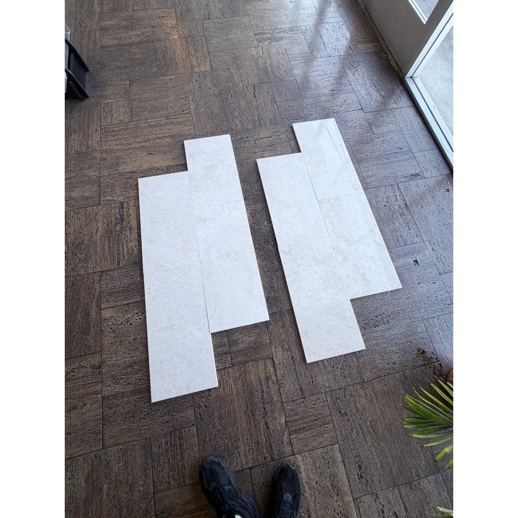 White Pearl Botticino Beige marble 12x24 tiles on dark wood floor