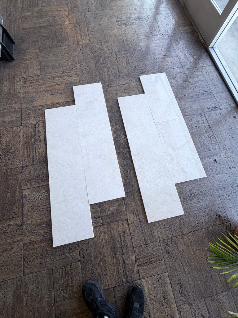 White Pearl Botticino Beige marble 12x24 tiles on dark wood floor