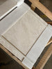 Packaged square tile with light marbled pattern from White Pearl Botticino Beige Marble collection
