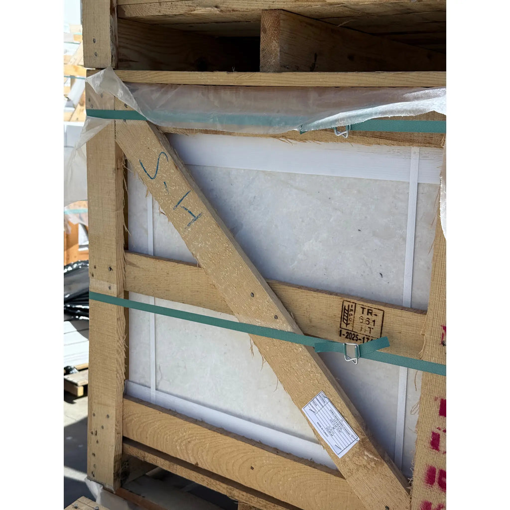 Wooden crate encasing artwork in White Pearl Botticino Beige Marble tile packaging