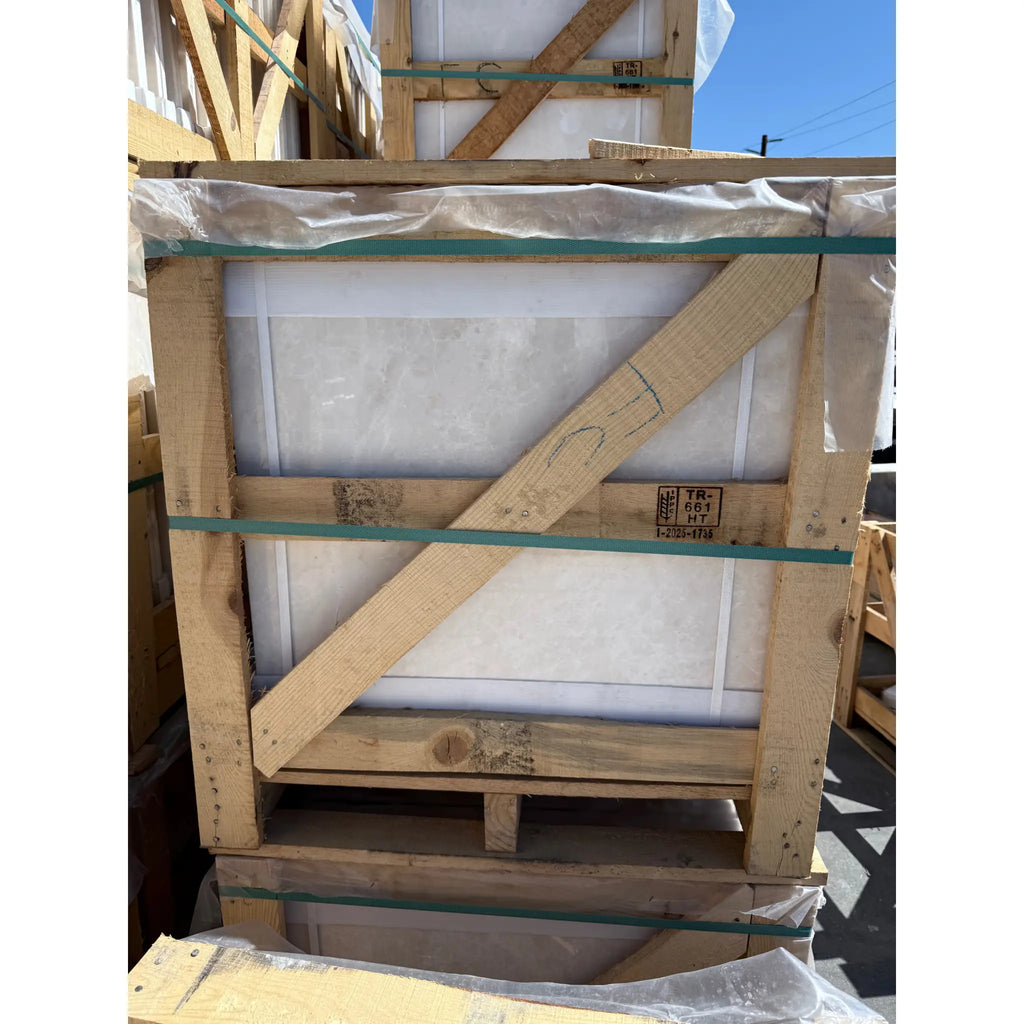 Wooden crate containing polished or honed White Pearl and Botticino Beige Marble slabs