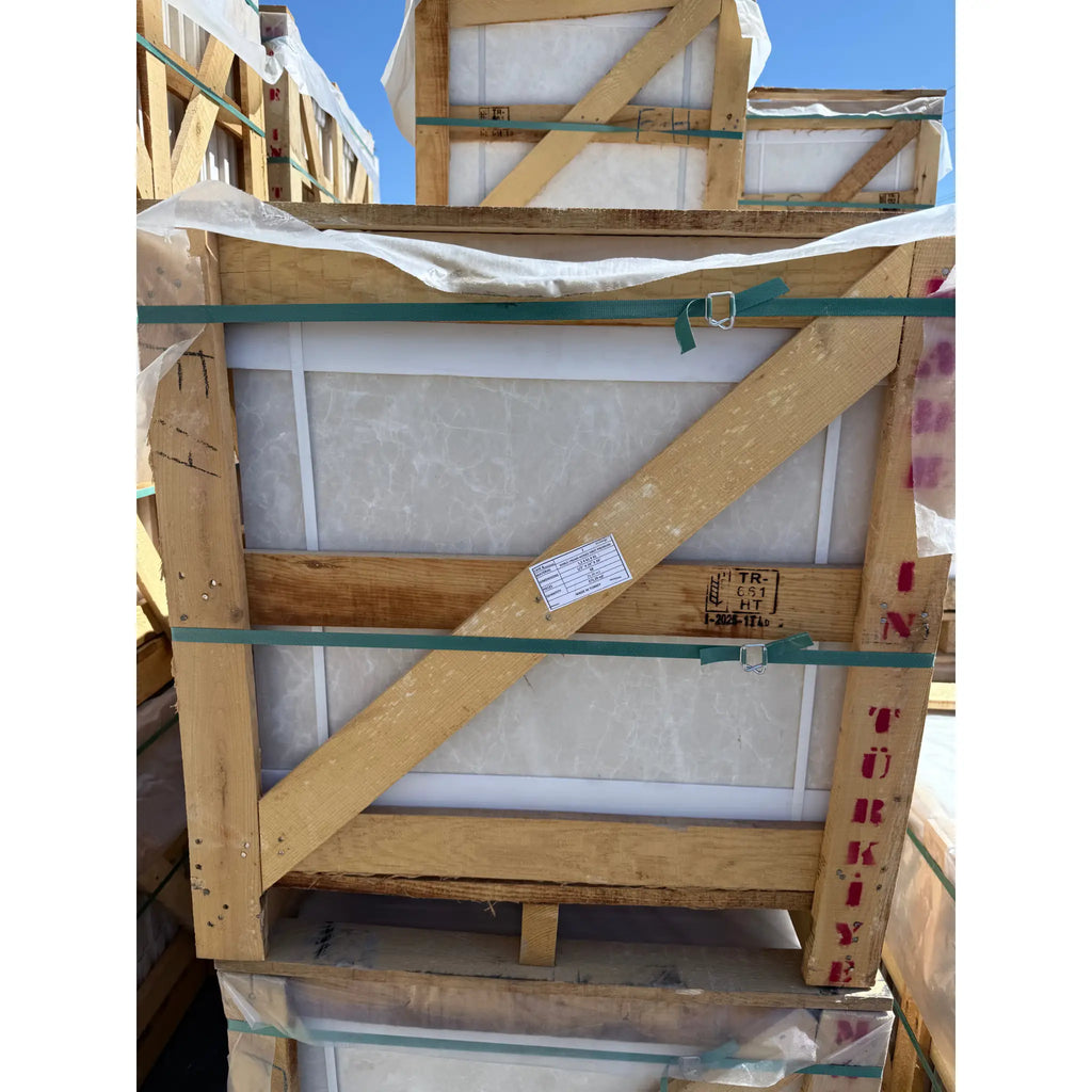 Wooden crate containing White Pearl and Botticino Beige Marble 24x24 slabs