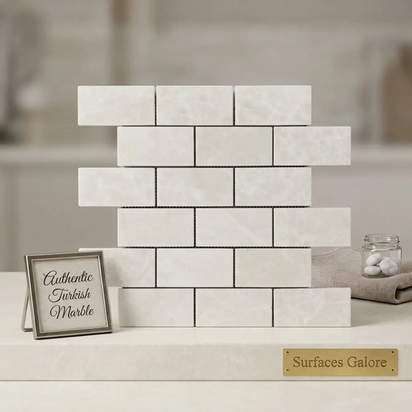 White pearl botticino beige marble 2x4 brick mosaic polished tiles arranged in a classic brick pattern