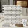 White pearl botticino beige marble mini brick mosaic tile with polished finish showcasing elegant stone texture
