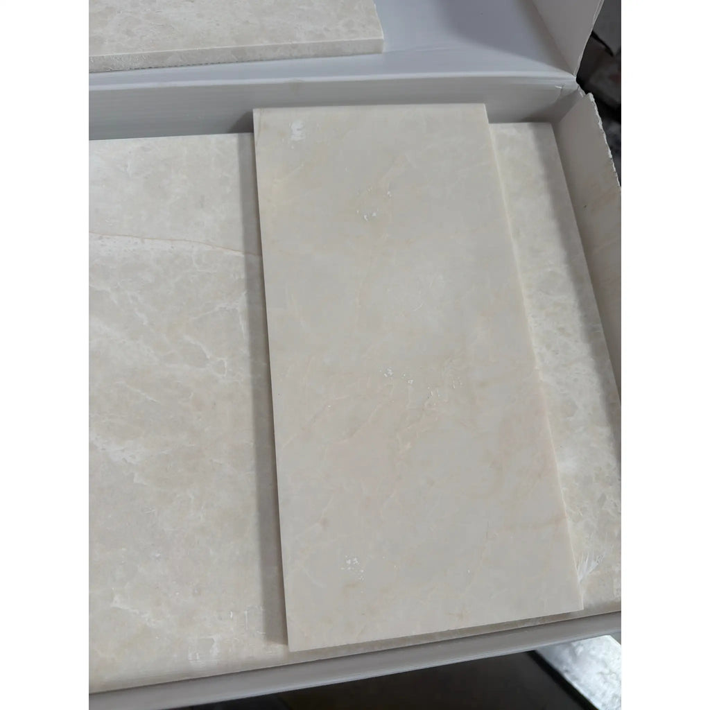 Beige marble effect rectangular tile with subtle veining and polished finish in white pearl botticino beige marble 6x12 size