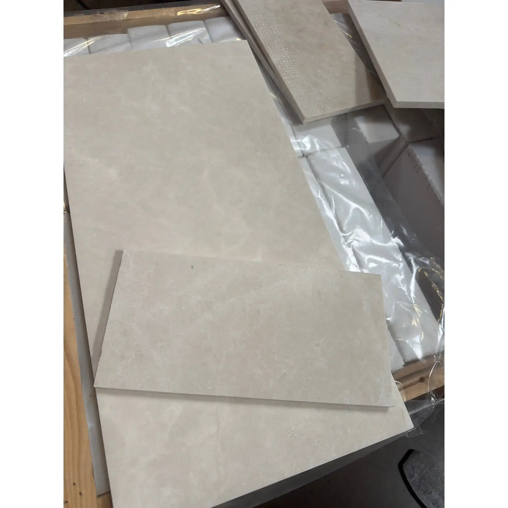 Beige marble-effect ceramic floor tiles with subtle veining in 6x12 polished or honed white pearl botticino beige style